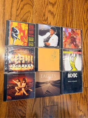 Assorted Lot Bundle Of CD’S Including AC/DC, Michael Jackson, Def Leppard & More